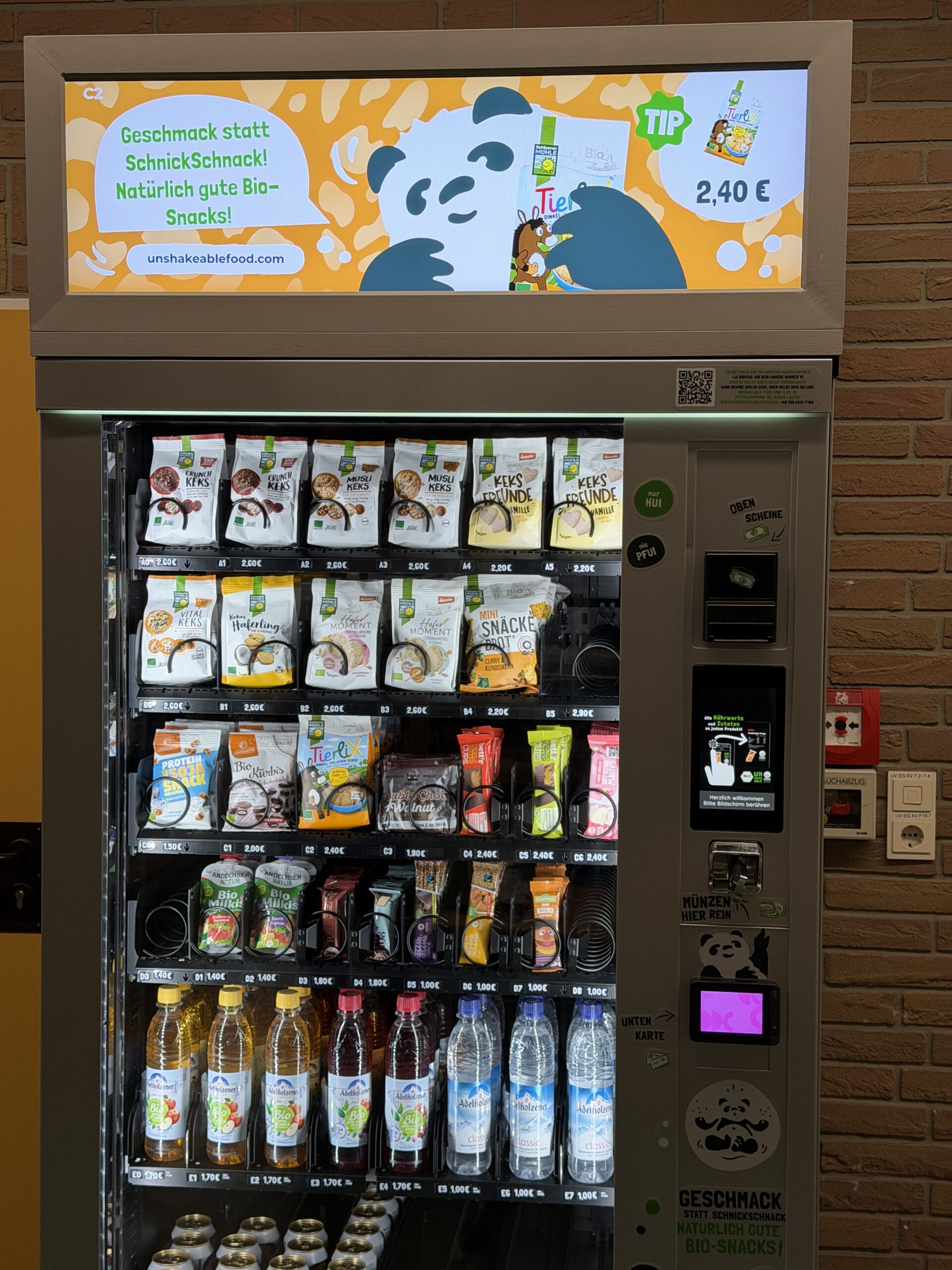 unshakeable-Snackautomat mit Bio-Snacks, Getränken und Bildschirm